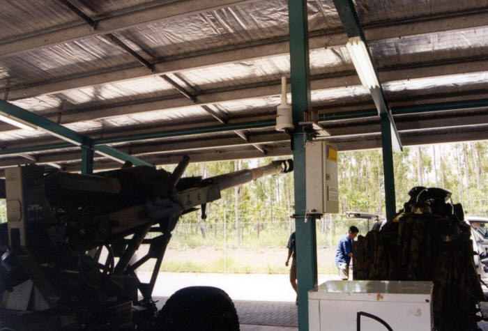 Semi sheltered test station with test coupons, wet candle apparatus, and data logger attached at an Army Base in Northern Australia. (Courtesy of DSTO Australia)