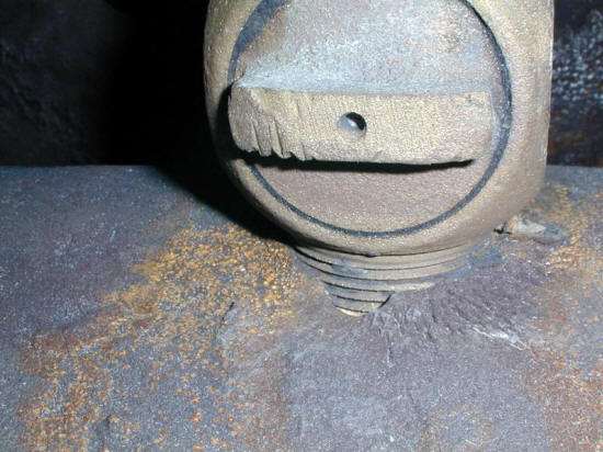 Corrosion of a water main ductile iron adjacent to a copper fitting