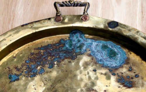 Corroded brass plate