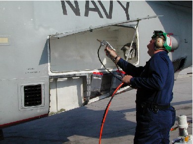 Fogging an aircraft aft port cargo bay